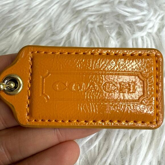 2" COACH Orange Patent Leather Fob Bag Charm Hang tag Hangtag - Picture 1 of 2